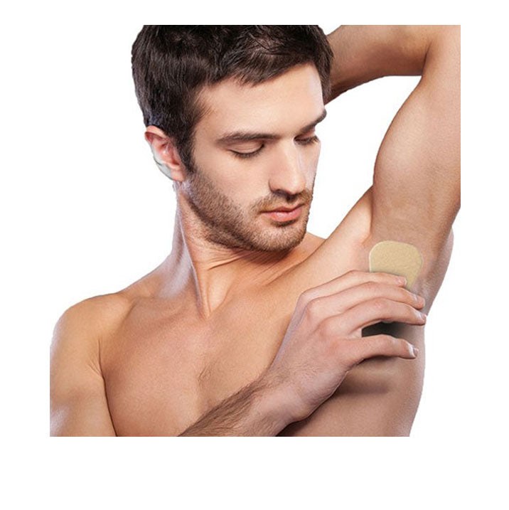 Man putting on his dandi® patch