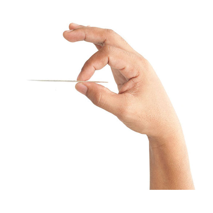 Man holding thin and discreet dandi® patch